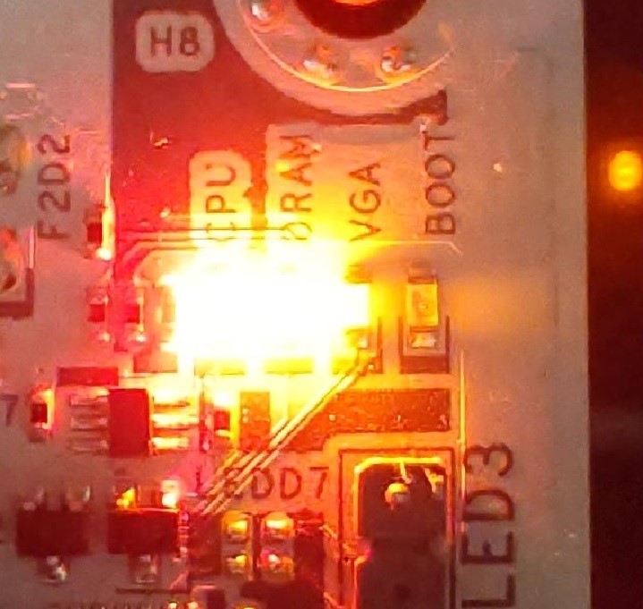 The CPU LED will remain solidly lit, and the DRAM LED will blink.